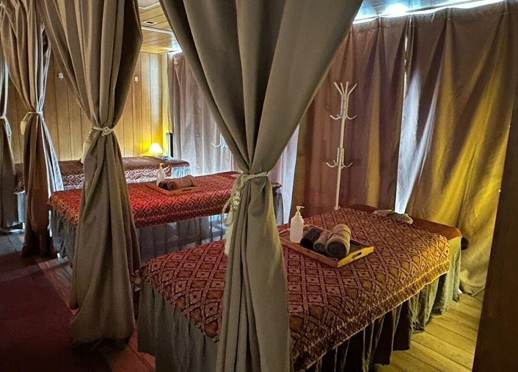 Cozy massage room at Impiana Genting, Genting Highlands, Pahang, MY with soft lighting and luxury decor.