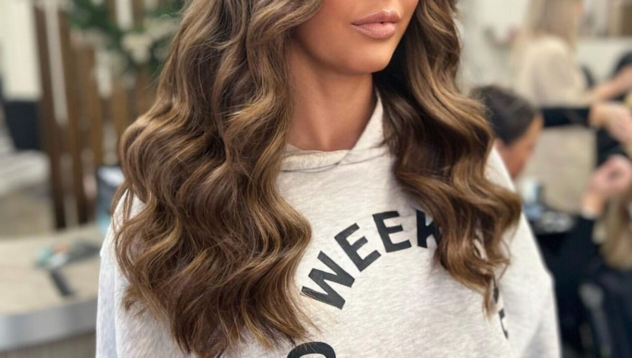 Elegant brunette waves styled at De La Mare, North Lanarkshire, UK, GB.