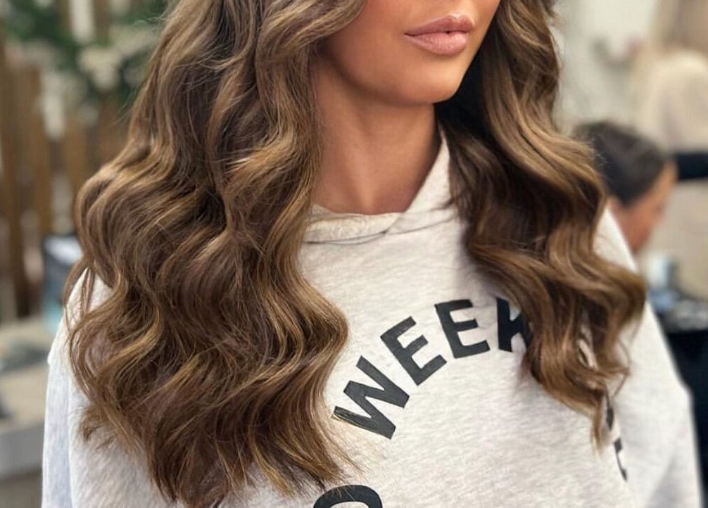 Elegant brunette waves styled at De La Mare, North Lanarkshire, UK, GB.