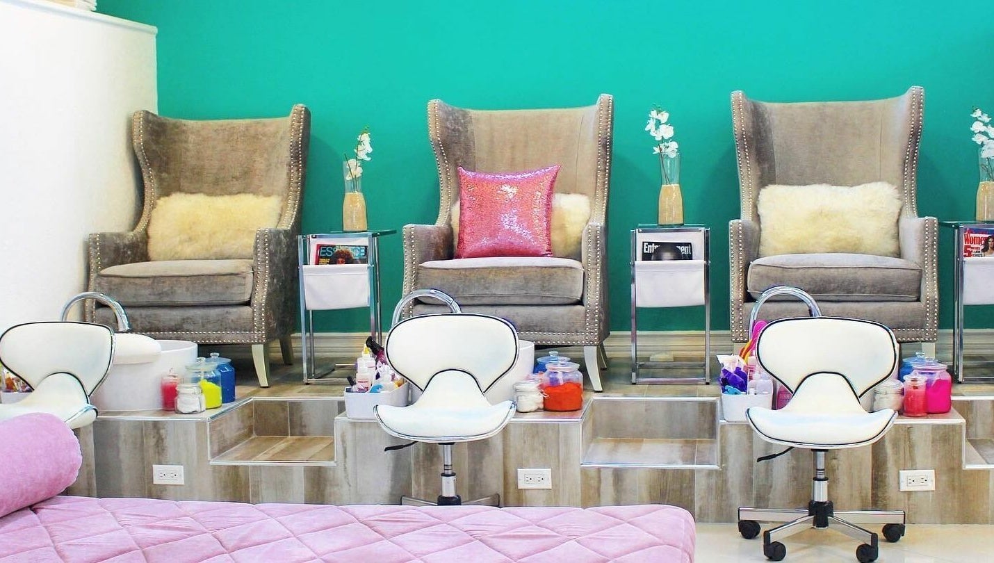 Plush pedicure chairs at Tip Sip Nails Bar, Montego Bay, St. James Parish, JM, creating a luxurious ambiance.