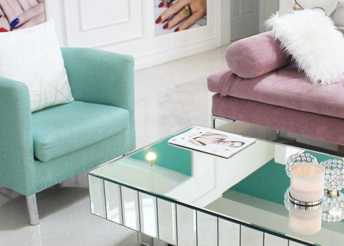 Elegant seating at Tip Sip Nails Bar, Montego Bay, St. James Parish, JM offers a stylish relaxation area.