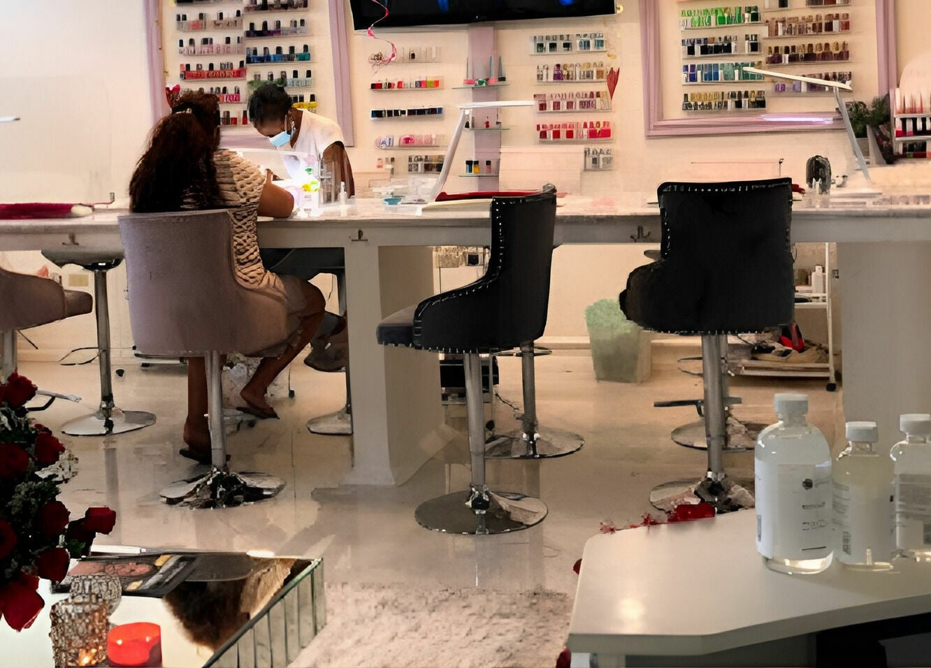 Elegant interior of Tip Sip Nails Bar, Montego Bay, St. James Parish, JM featuring manicure stations.