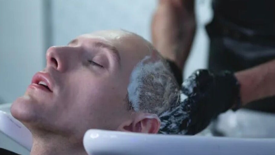 Experience a relaxing wash at BROOKS Hair Tailoring, Watford, England, GB, where luxury meets style.