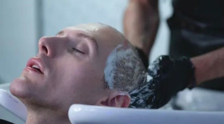 Experience a relaxing wash at BROOKS Hair Tailoring, Watford, England, GB, where luxury meets style.