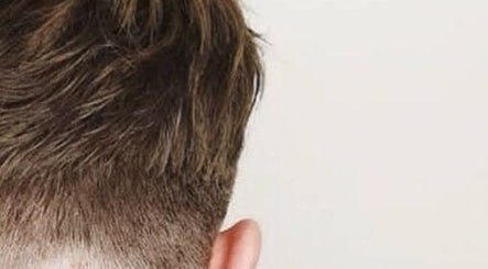 Close-up of a stylish men's haircut at BROOKS Hair Tailoring, Watford, England, GB.