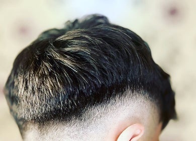 Close-up of a stylish men's fade haircut at FadeLinez, Peterborough, England, GB.
