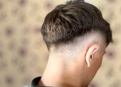 Close-up of a stylish fade haircut by FadeLinez (Peterborough Mobile Barber) in Peterborough, England, GB.
