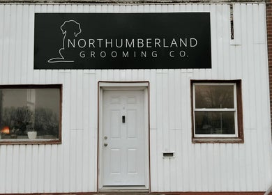 Front facade of Northumberland Grooming Co. Brighton in Brighton, Ontario, CA featuring logo and entrance.