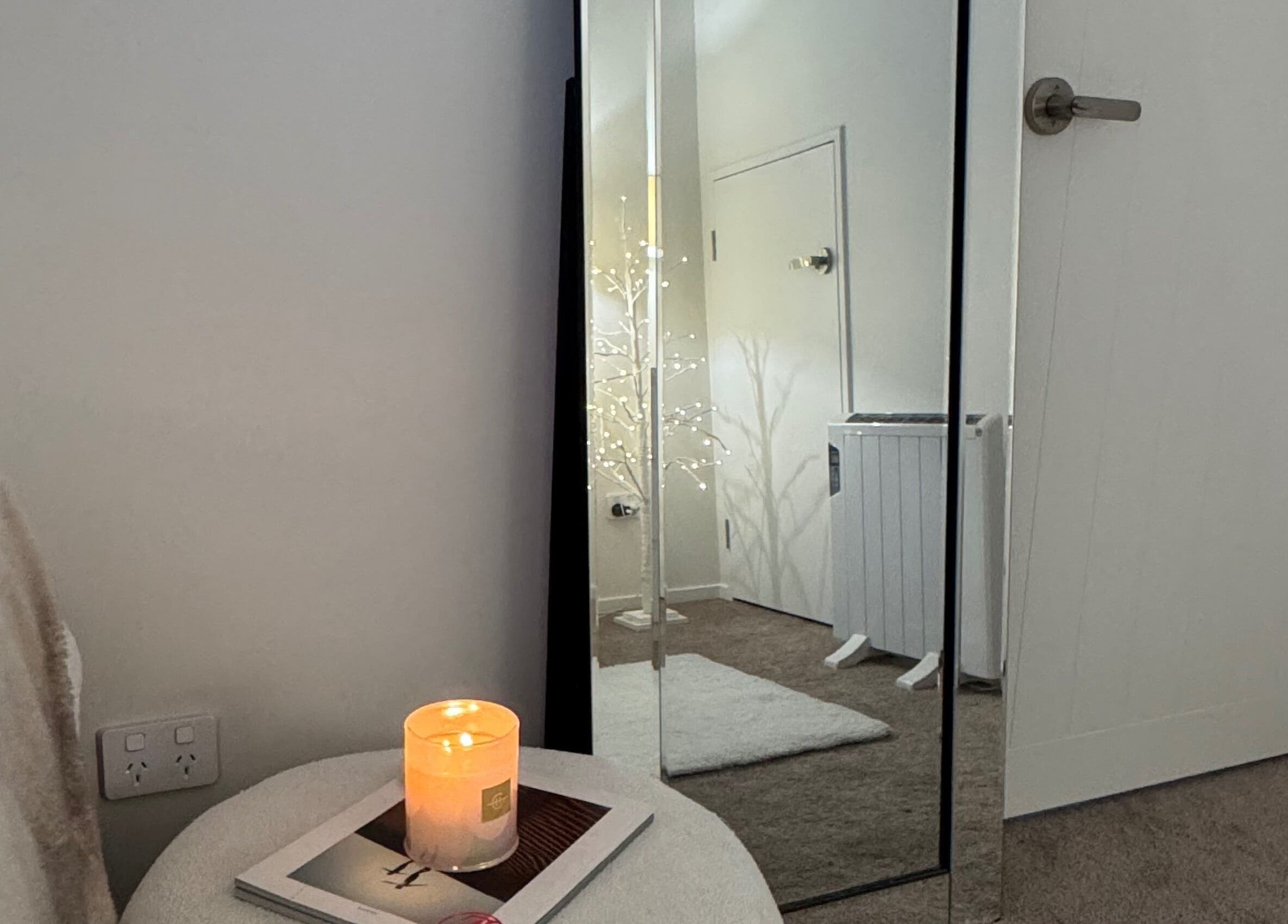 Peaceful candlelit ambiance at Lash L'amour, Whangaparāoa, Auckland, NZ, enhancing relaxation and elegance.