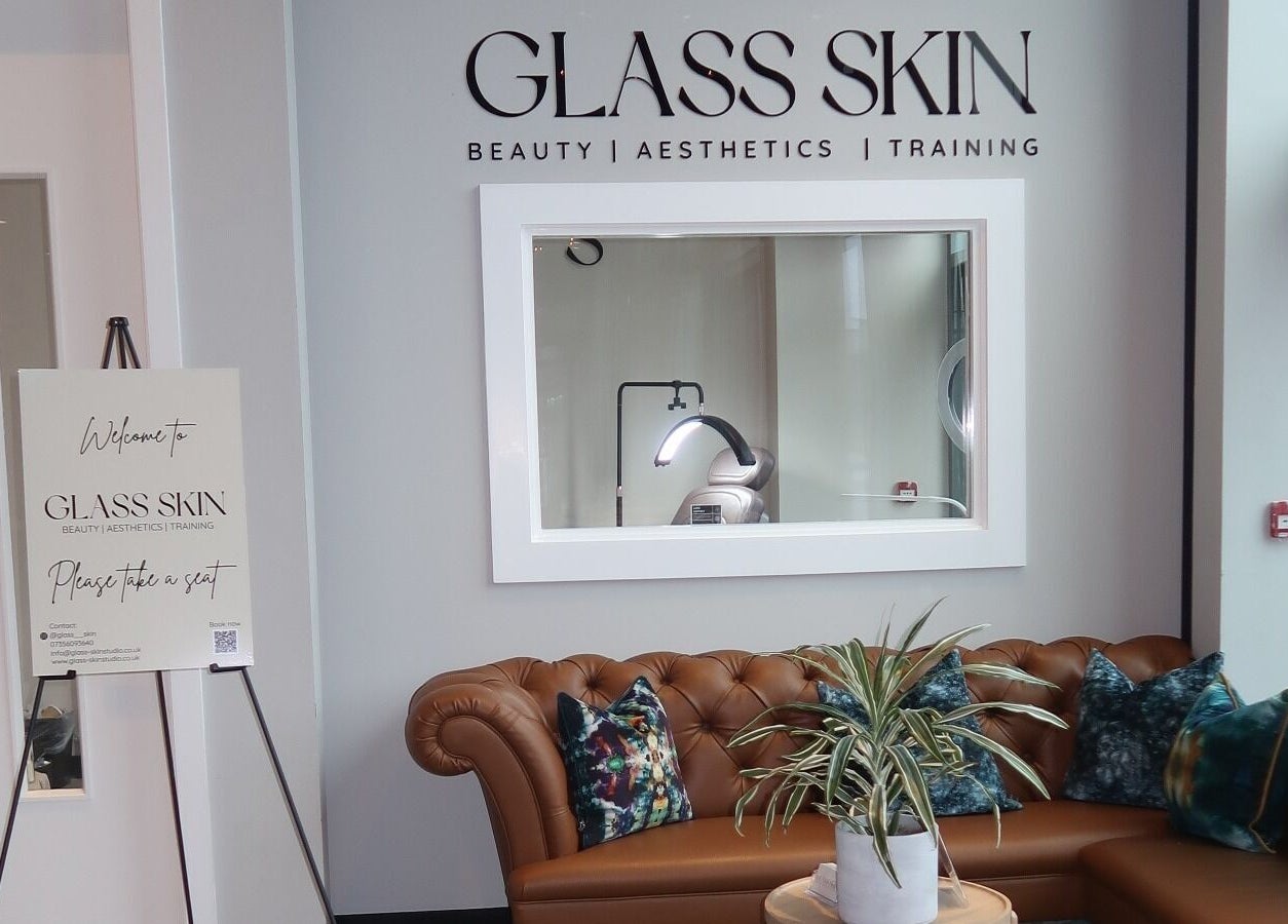 Welcoming lounge with chic decor at Glass Skin Studio, Glasgow, Scotland, GB.