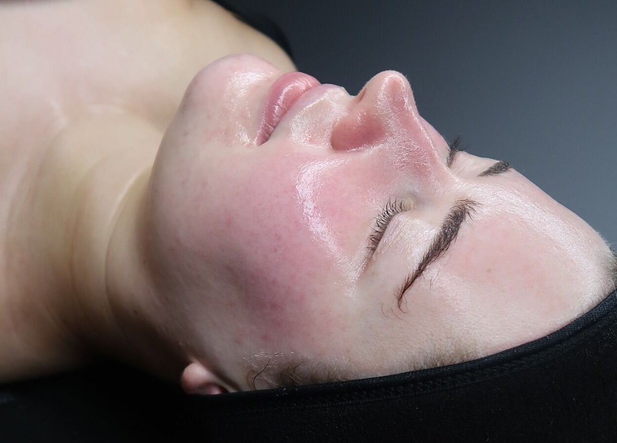 Glowing skin treatment at Glass Skin Studio, Glasgow, Scotland, GB, showing a client's rejuvenated skin.