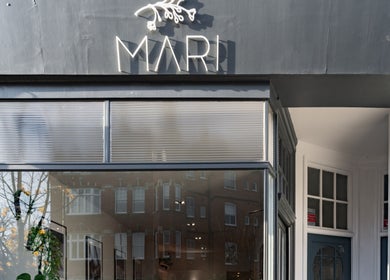 Front of Salon Mari Chiswick, a stylish beauty venue in London, England, GB with elegant signage.