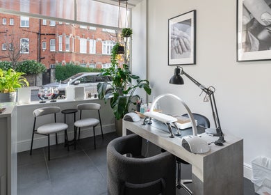 Cozy nail station at Salon Mari Chiswick, London, England, GB, featuring elegant decor and a stylish setup.