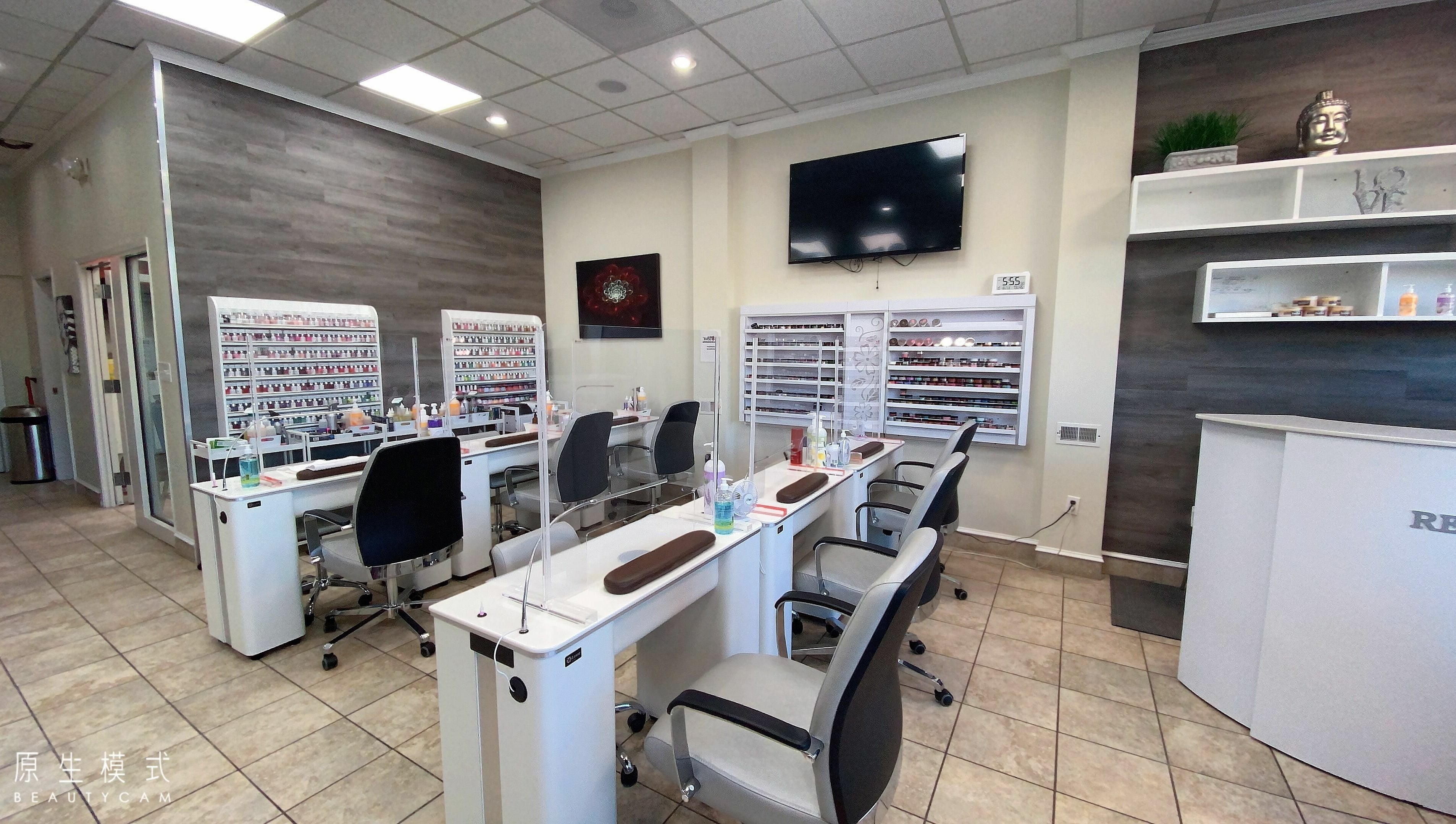 Modern manicure stations at Avalon Nails and Spa, Silver Spring, Maryland, US, featuring sleek design and nail products.