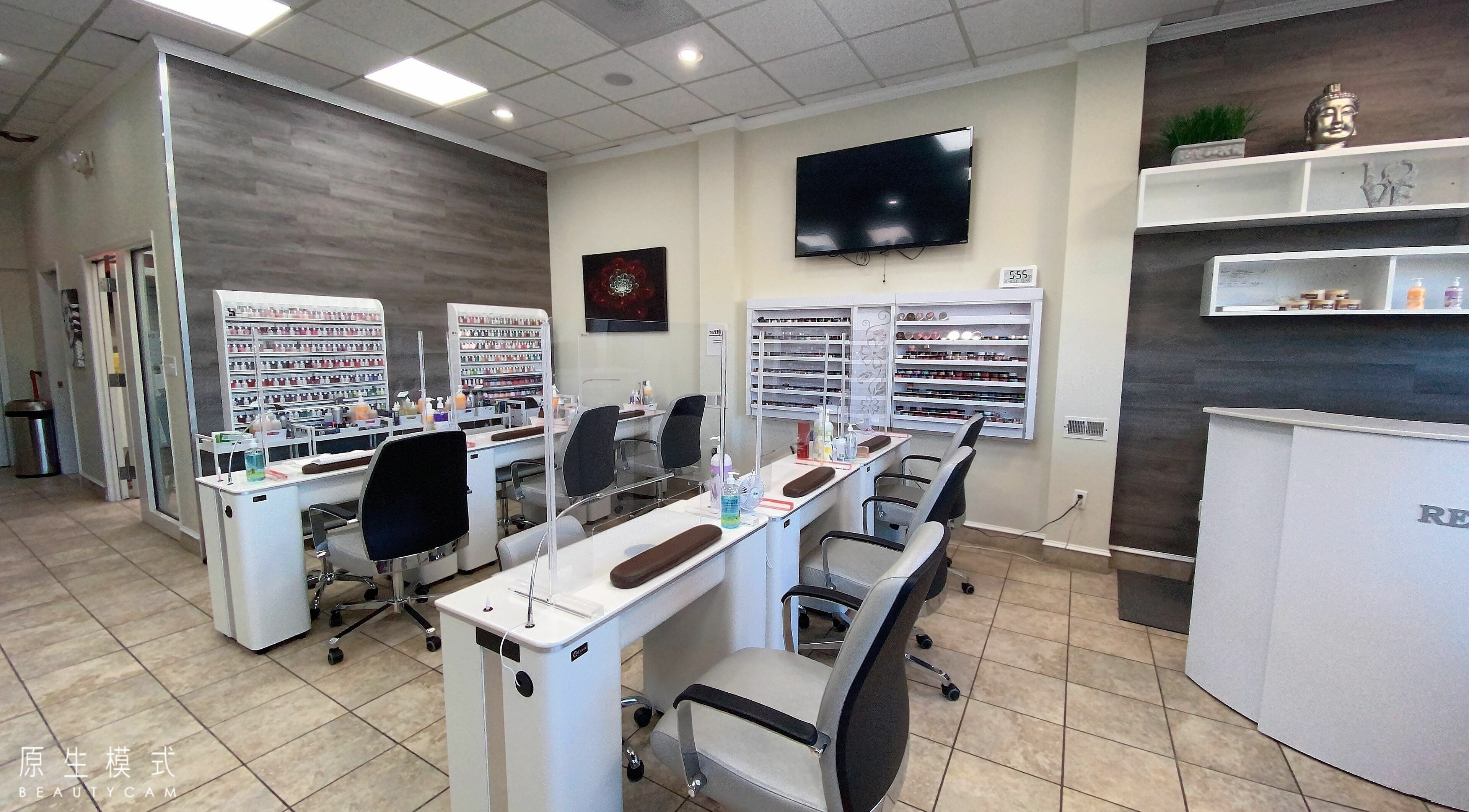 Modern manicure stations at Avalon Nails and Spa, Silver Spring, Maryland, US, featuring sleek design and nail products.