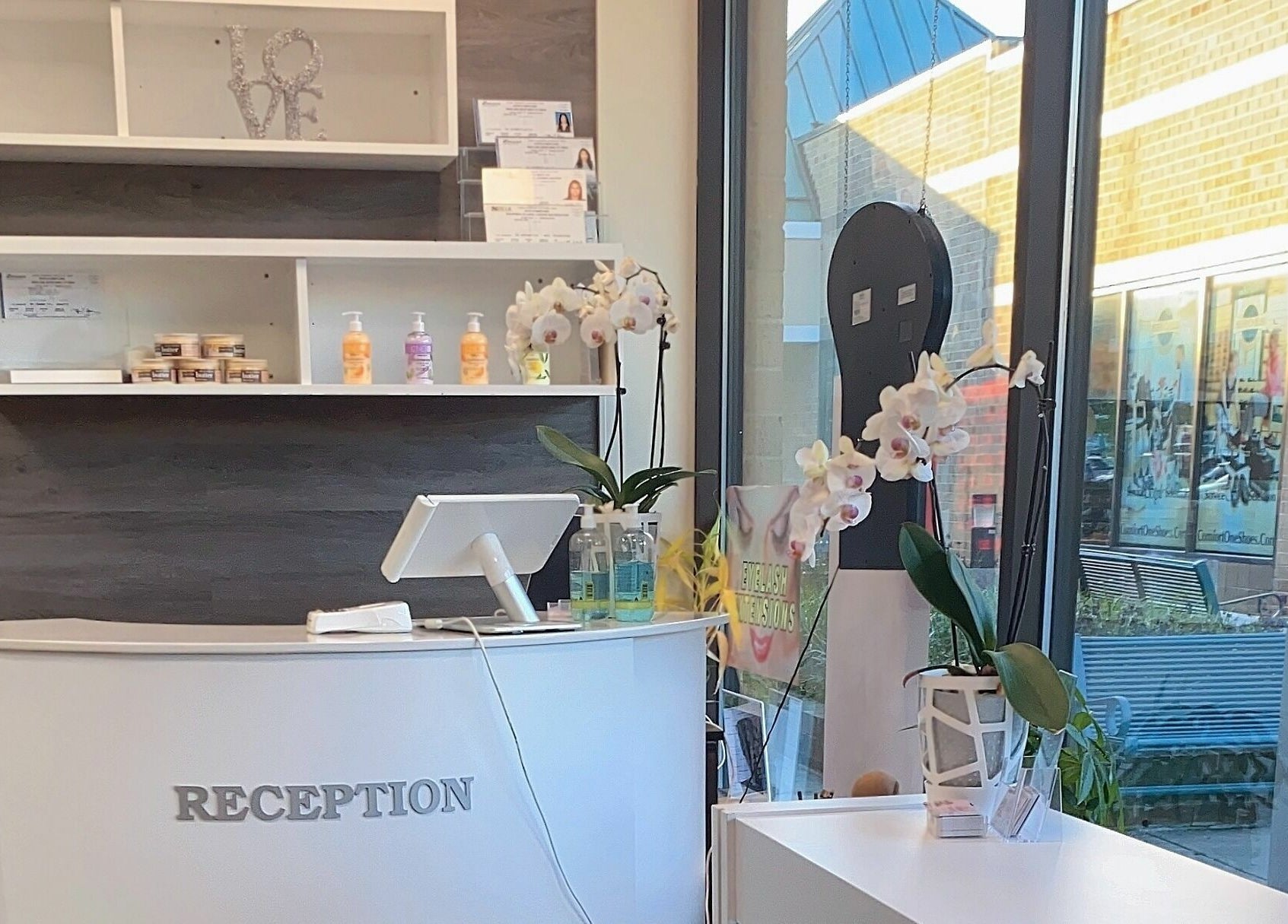 Reception area of Avalon Nails and Spa, Silver Spring, Maryland, US with elegant decor and natural light.