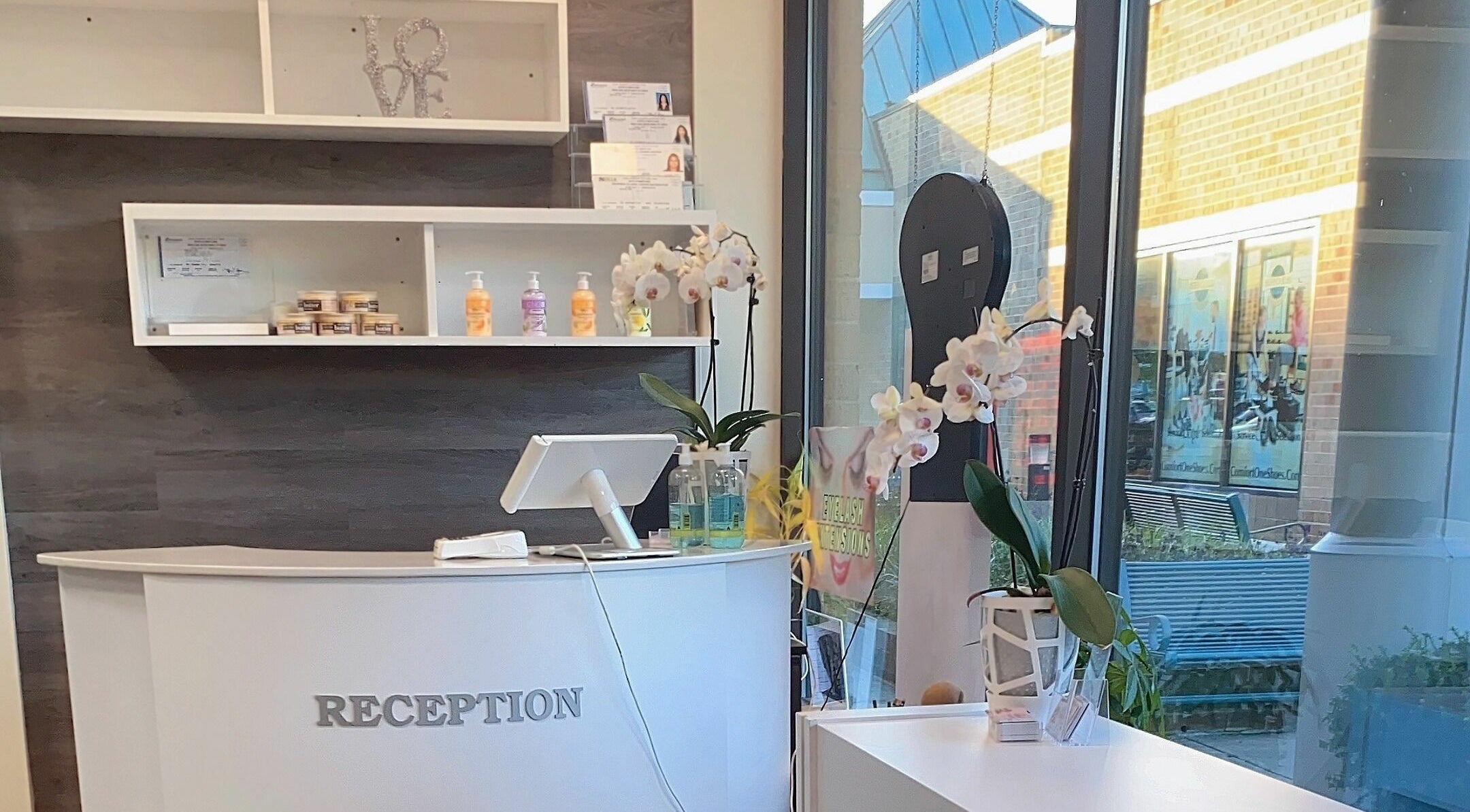 Reception area of Avalon Nails and Spa, Silver Spring, Maryland, US with elegant decor and natural light.