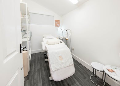 The Cure Clinic's peaceful treatment room in London, England, GB, featuring a clean, modern aesthetic.