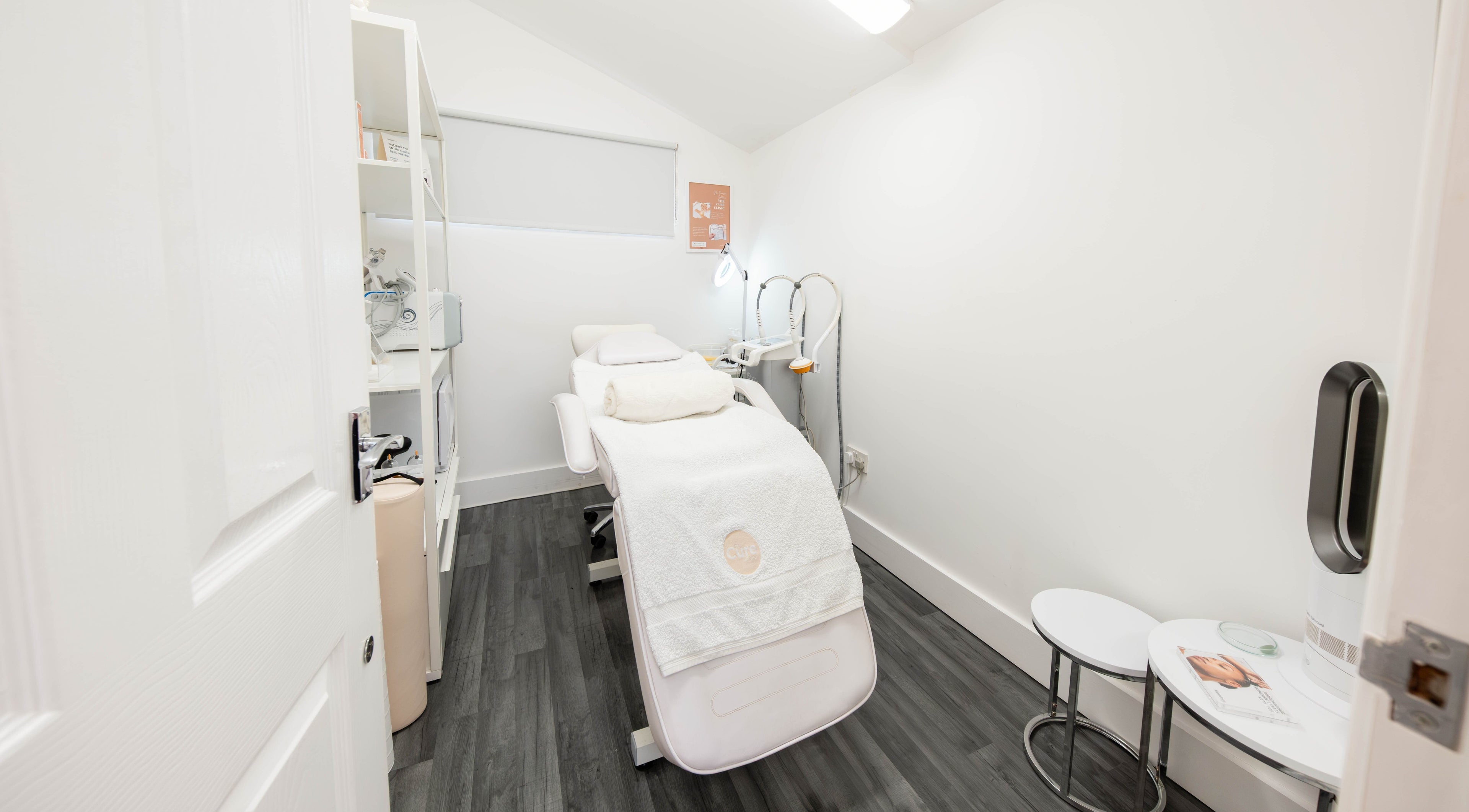 The Cure Clinic's peaceful treatment room in London, England, GB, featuring a clean, modern aesthetic.