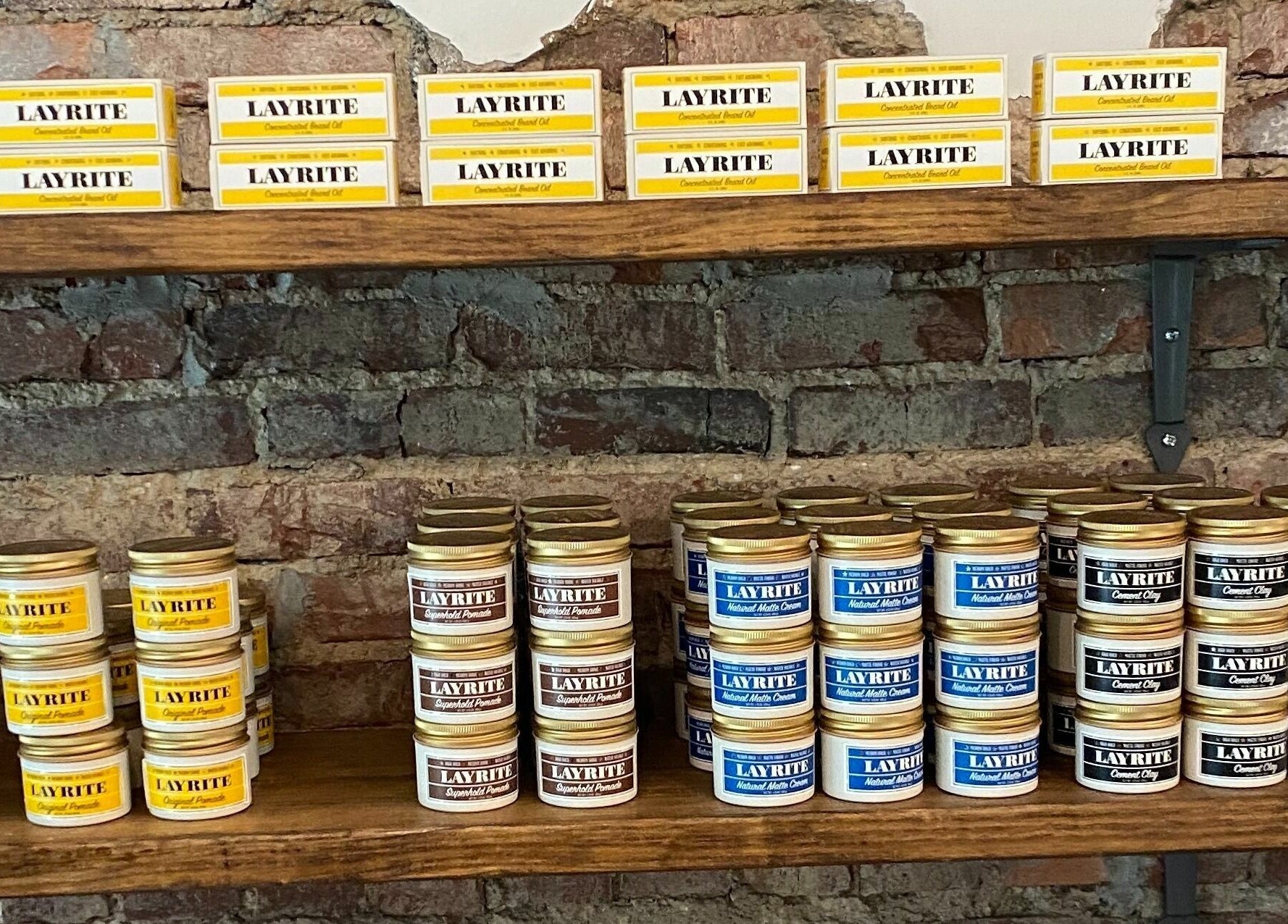 Shelves of Layrite products at Public Square Barbers, Gallatin, Tennessee, US.