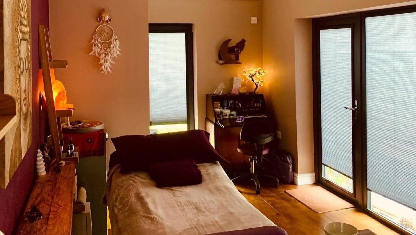Calming therapy room at Wellbeing and Healing with Lisa, Birkenhead, England, GB, featuring soft lighting and decor.