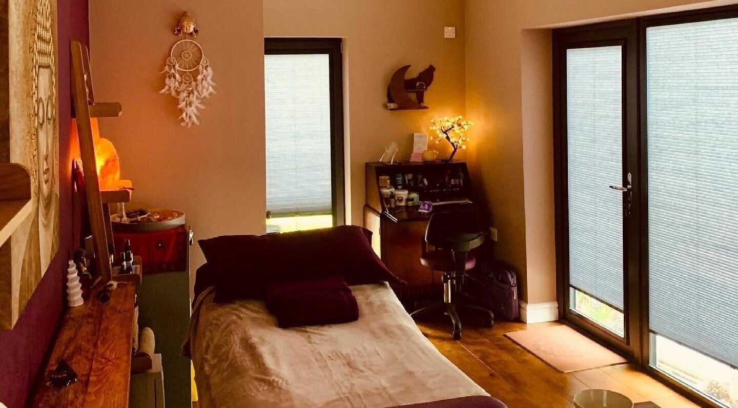 Calming therapy room at Wellbeing and Healing with Lisa, Birkenhead, England, GB, featuring soft lighting and decor.