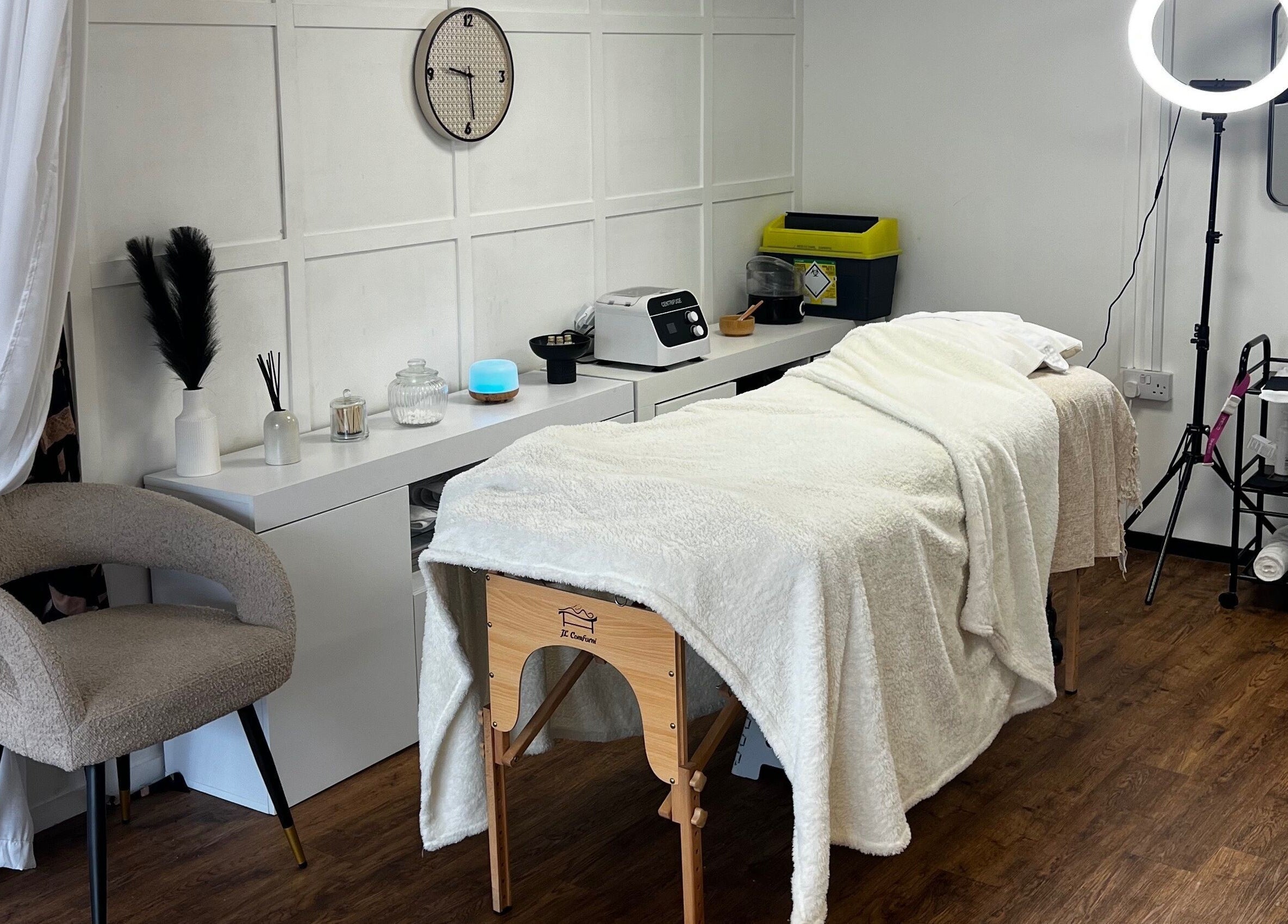 Relaxing treatment room at Airbrushed Aesthetics in Spalding, England, GB, featuring cozy decor and modern amenities.