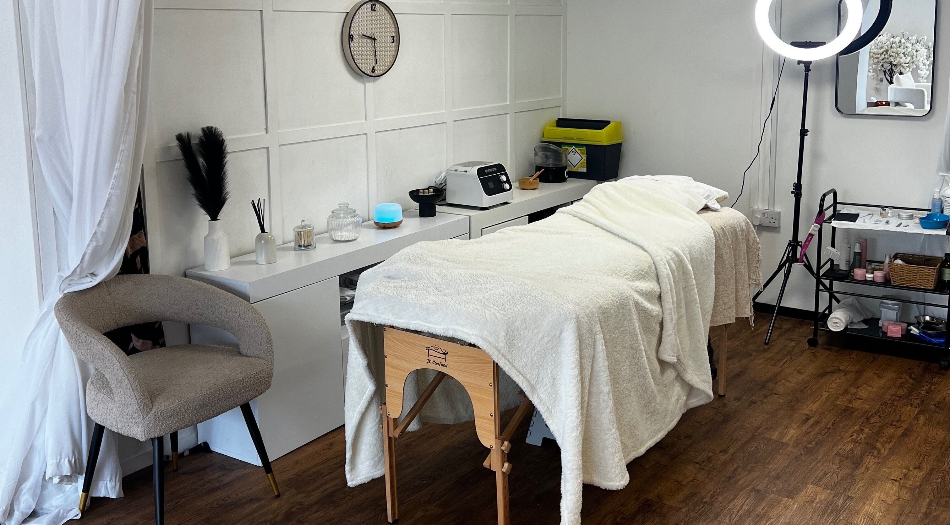 Relaxing treatment room at Airbrushed Aesthetics in Spalding, England, GB, featuring cozy decor and modern amenities.