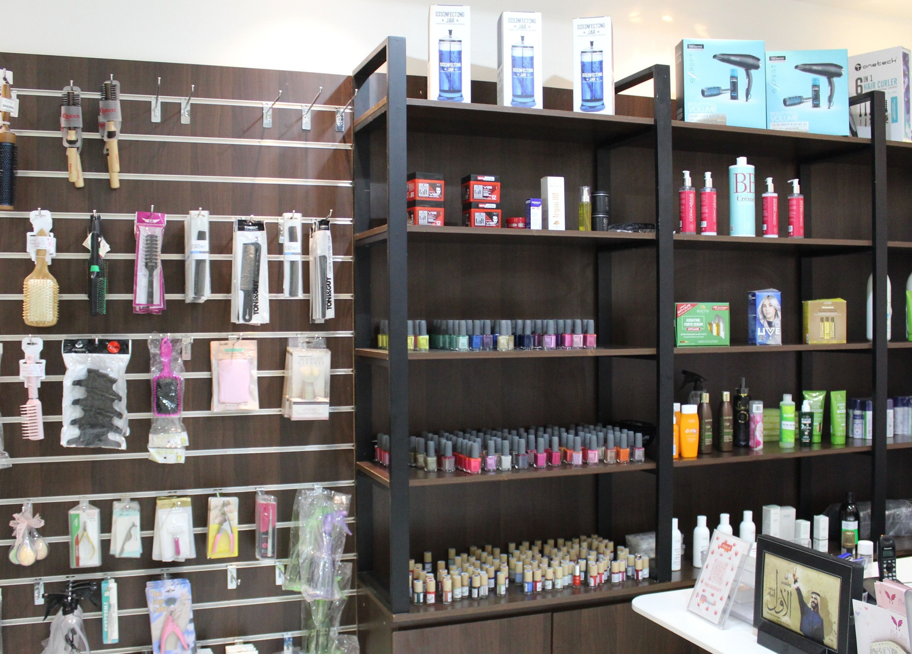 Shelves of beauty products at Pink Line Beauty Salon, Dubai, دبي, AE showcasing diverse grooming tools.