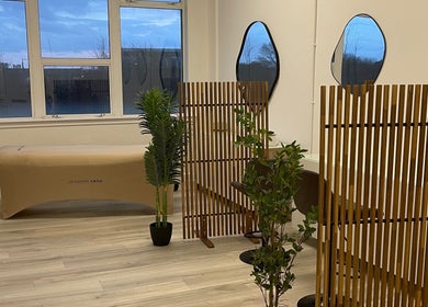 Elegant beauty space with mirrors and wooden decor at Twenty2 Cosmetics, Clydebank, Scotland, GB.