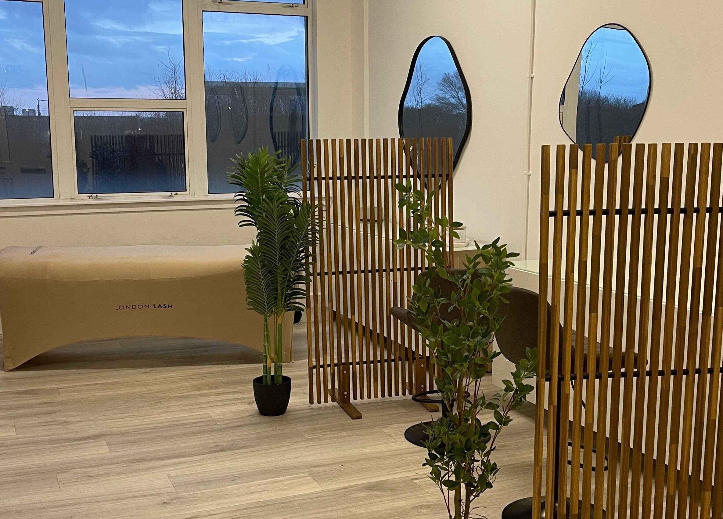 Elegant beauty space with mirrors and wooden decor at Twenty2 Cosmetics, Clydebank, Scotland, GB.