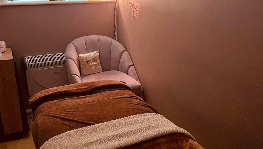 Relaxing therapy room at Danielle’s Beauty, Didcot, England, with a plush chair and treatment table.