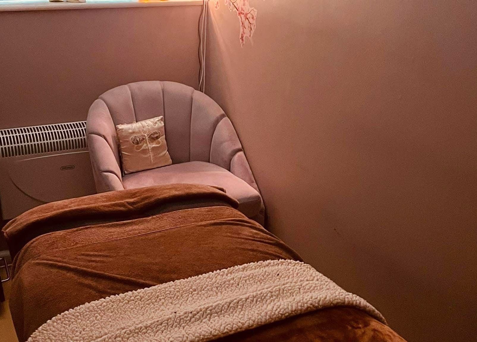 Relaxing therapy room at Danielle’s Beauty, Didcot, England, with a plush chair and treatment table.