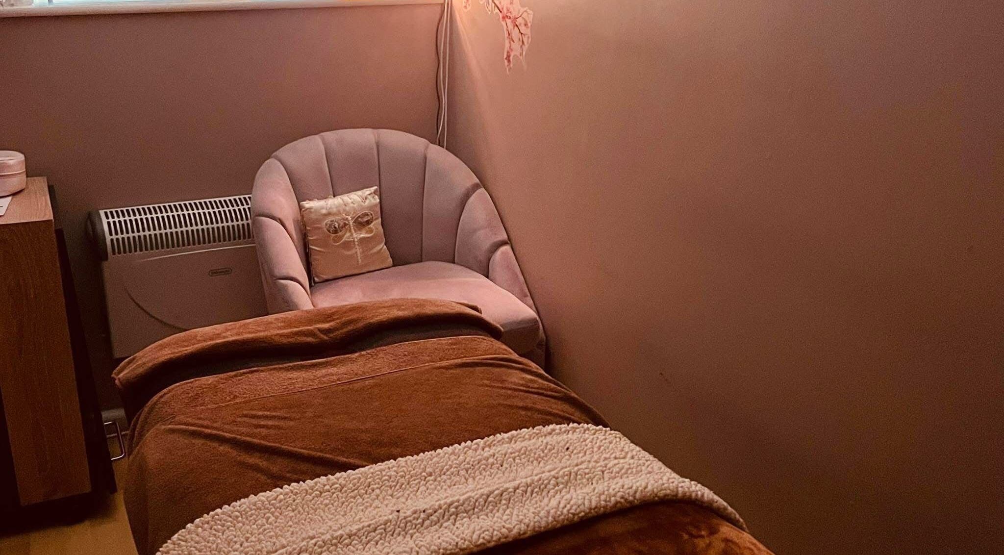 Relaxing therapy room at Danielle’s Beauty, Didcot, England, with a plush chair and treatment table.