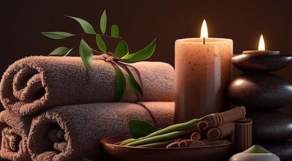 Relaxing spa setup with candles and towels at Danielle’s Beauty, Didcot, England, GB for a soothing experience.