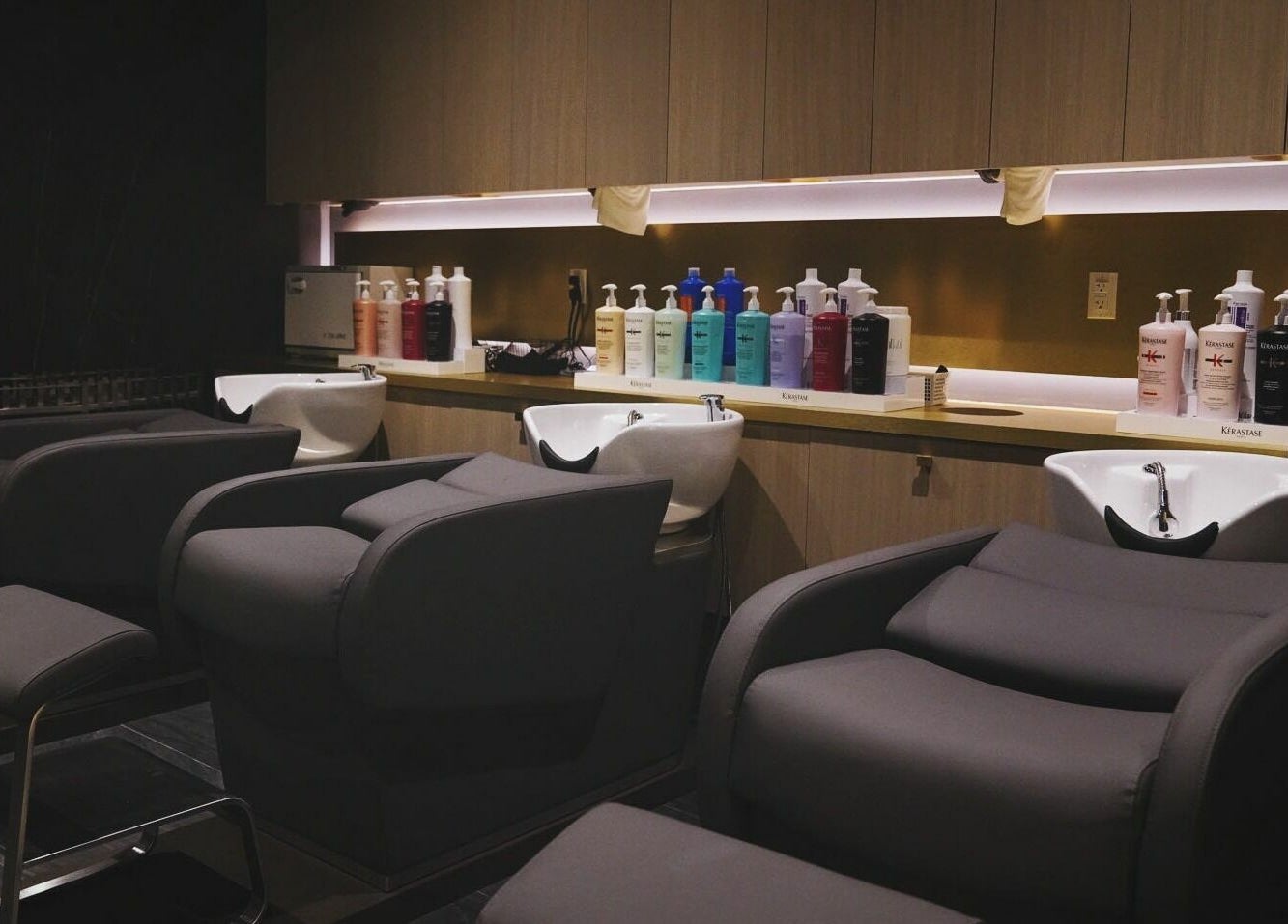 Elegant salon chairs and shampoo station at House of Colour, Richmond, British Columbia, CA.