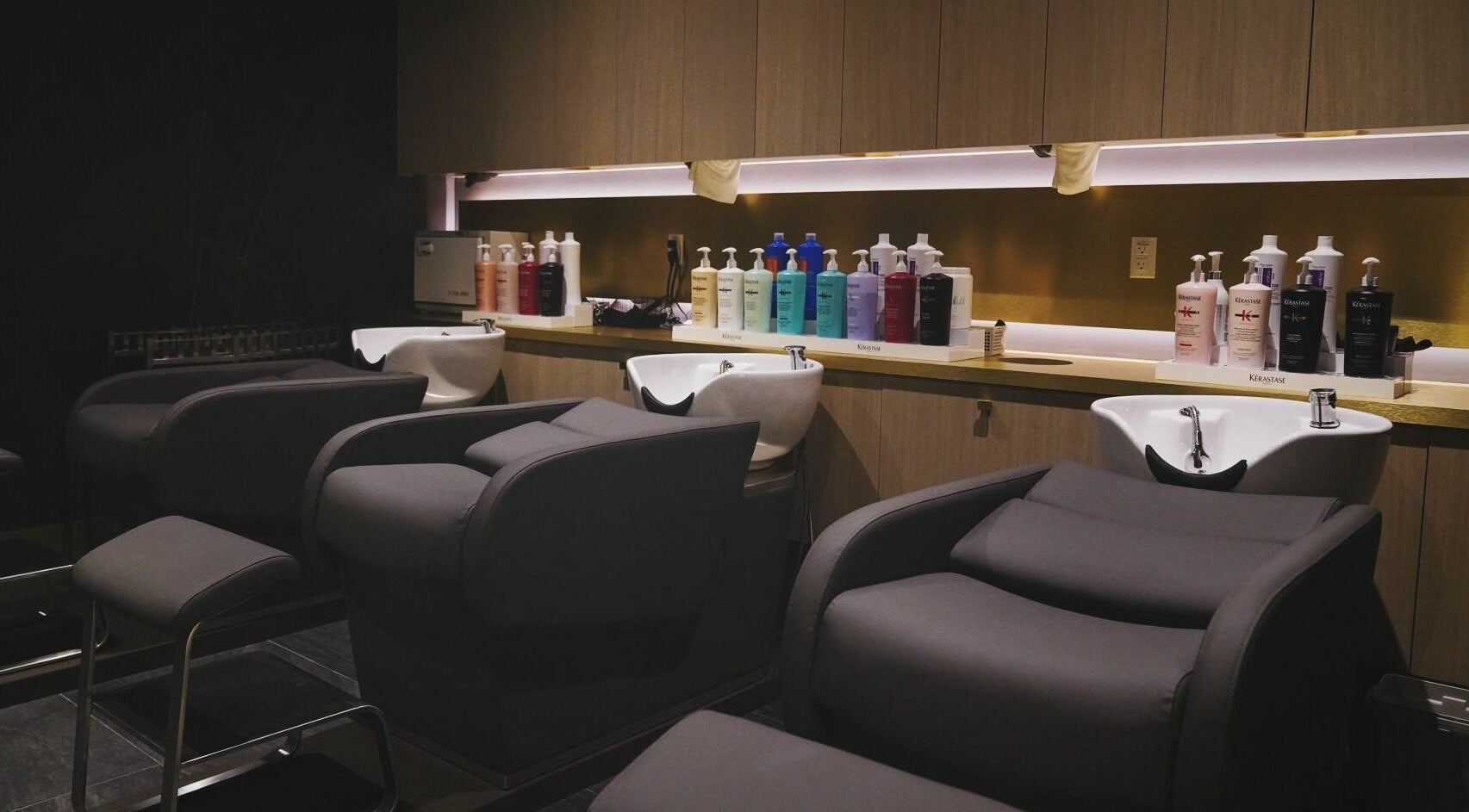 Elegant salon chairs and shampoo station at House of Colour, Richmond, British Columbia, CA.