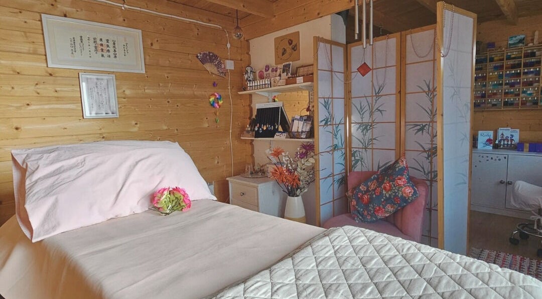 Relaxing therapy room at Land of Reiki and Aroma by Sol, Sutton-in-Ashfield, England, GB with serene decor.