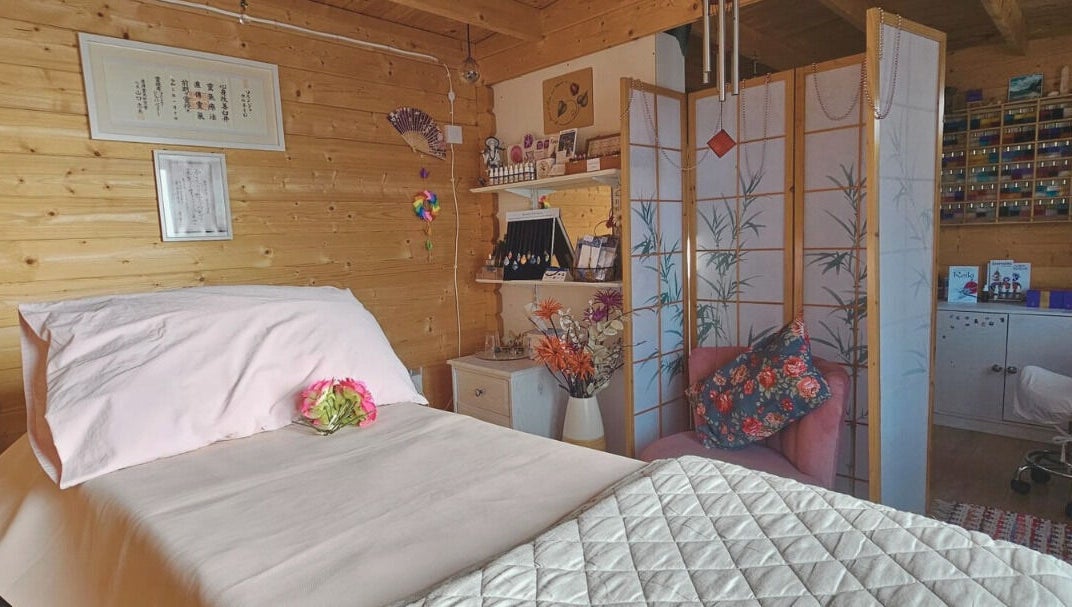 Cozy treatment room at Land of Reiki and Aroma by Sol, Sutton-in-Ashfield, England, GB, featuring elegant decor.