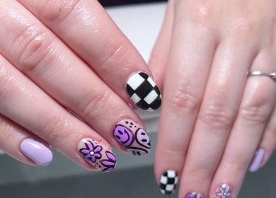 Colorful nail art at Rebecca-Emilie Nails & Beauty, Castle Donington, England, GB showcasing creative designs.