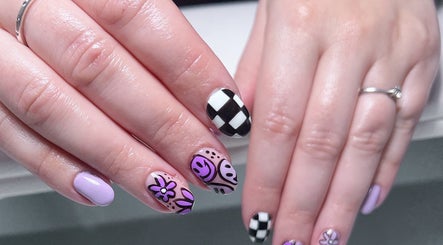Colorful nail art at Rebecca-Emilie Nails & Beauty, Castle Donington, England, GB showcasing creative designs.