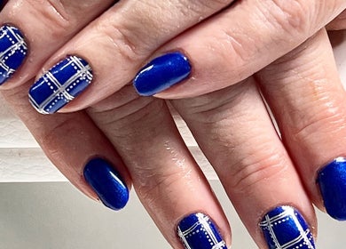 Stylish blue nail art at Rebecca-Emilie Nails & Beauty, Castle Donington, England, GB.