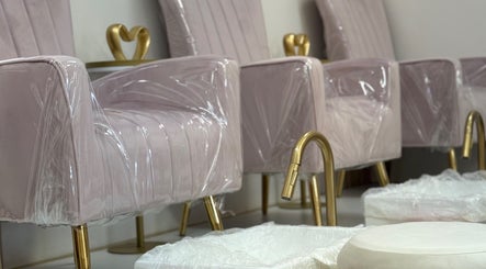 Elegant nail salon chairs at R. Luxury Nails & Beauty in St. Catharines, Ontario, CA offering premium comfort.