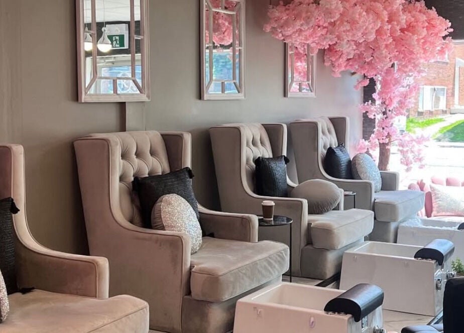 Elegant nail salon seating at Hamilton / R. Luxury Nails & Beauty, Hamilton, Ontario, CA with chic decor.