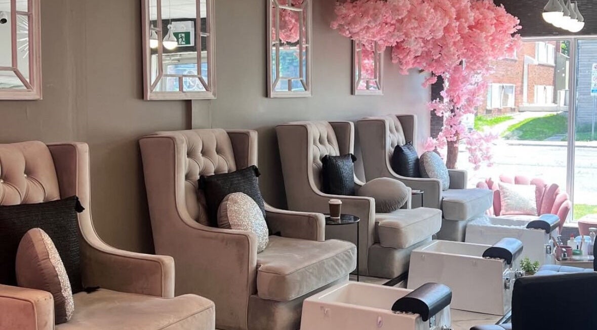 Elegant nail salon seating at Hamilton / R. Luxury Nails & Beauty, Hamilton, Ontario, CA with chic decor.