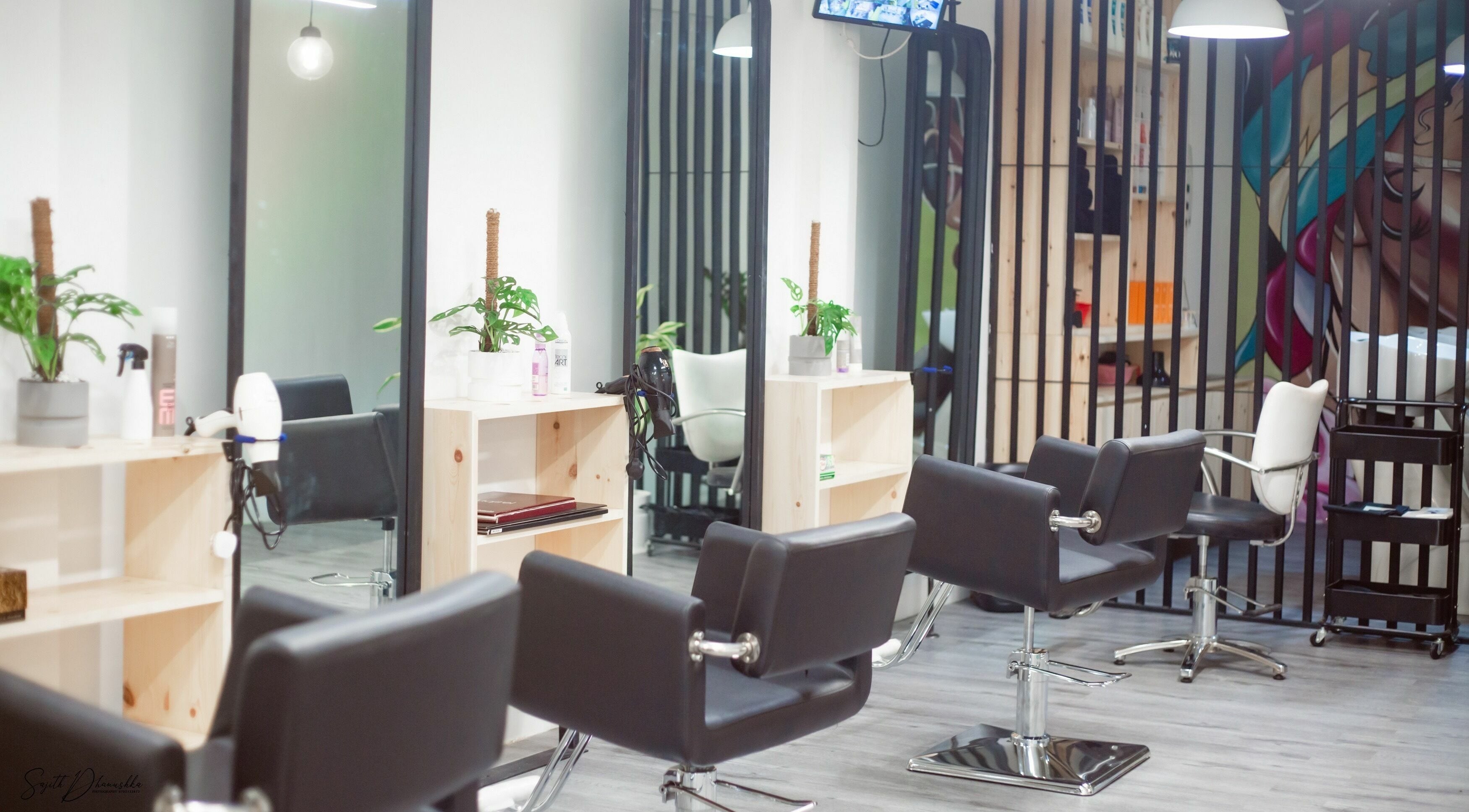 Modern stylist chairs at SalonDmesh, Maharagama, Western Province, LK. Sleek, inviting atmosphere.