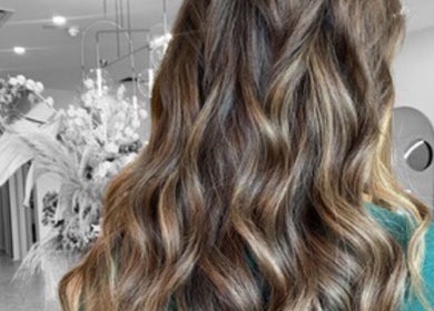 Elegant, wavy hair at SJ Hair Collective, Innaloo, Western Australia, AU, showcasing expert styling.