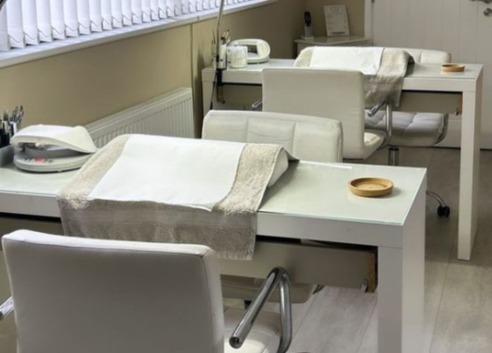 Modern manicure stations at Revitalize Beauty and Aesthetics, Westgate-on-Sea, England, GB, offering tranquil treatments.