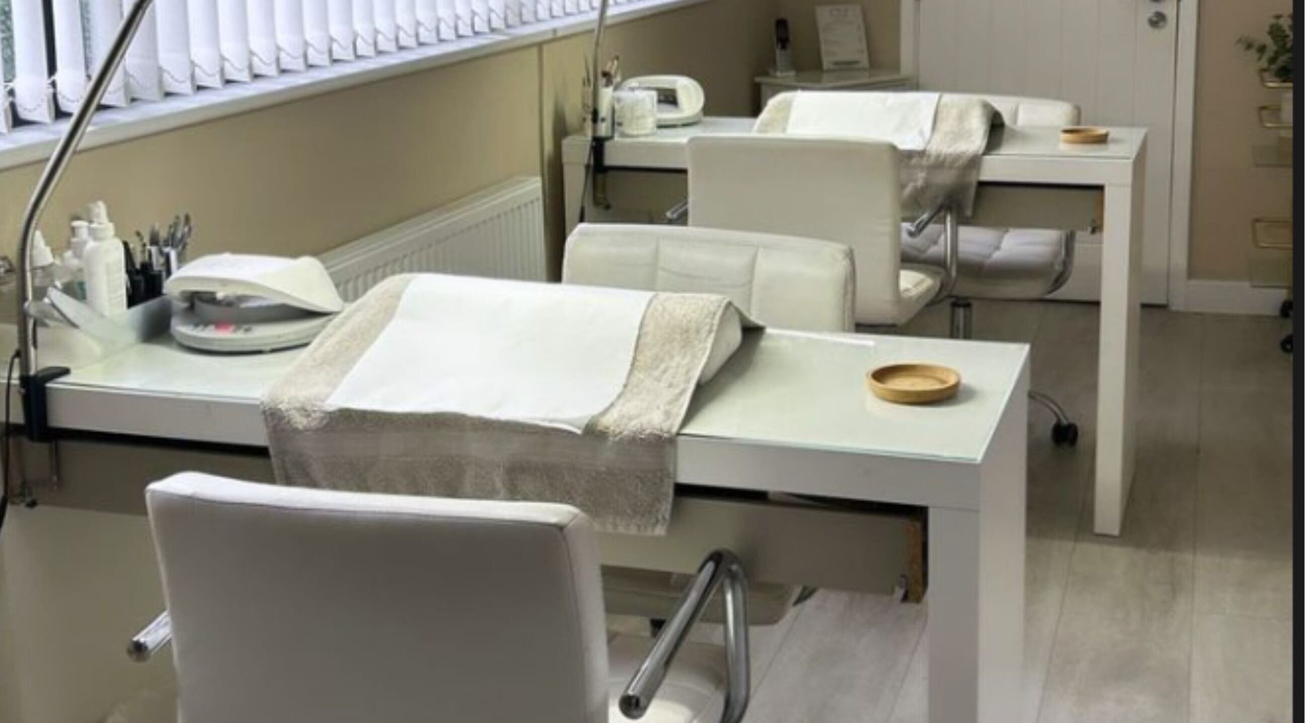 Modern manicure stations at Revitalize Beauty and Aesthetics, Westgate-on-Sea, England, GB, offering tranquil treatments.