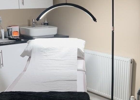 Treatment room at Revitalize Beauty and Aesthetics, Westgate-on-Sea, featuring a modern setup for ultimate relaxation.